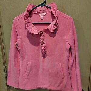 Lilly Pulitzer pink fleece pullover with a ruffled neckline and pockets.